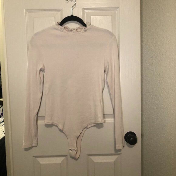 PINKMSTYLE Tops - PINKMSTYLE cream ruffle mock neck long sleeve bodysuit with snap closure size L
